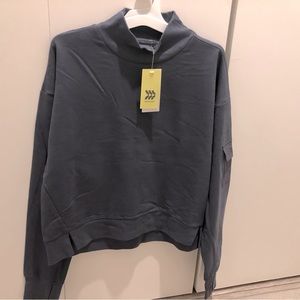 Brand new all in motion cropped sweater.